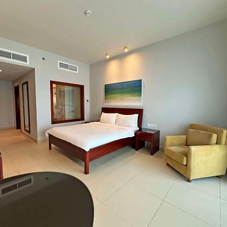 ラディソン ブルー リゾート フジャイラ エクステリア 写真 A bedroom at the hotel