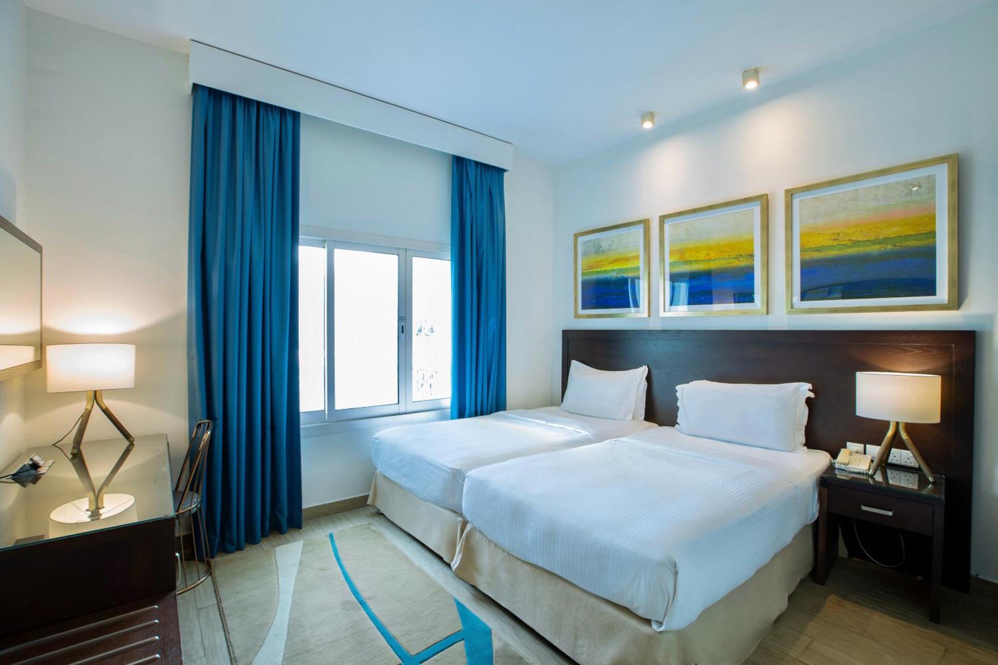 ラディソン ブルー リゾート フジャイラ エクステリア 写真 A bedroom at the hotel
